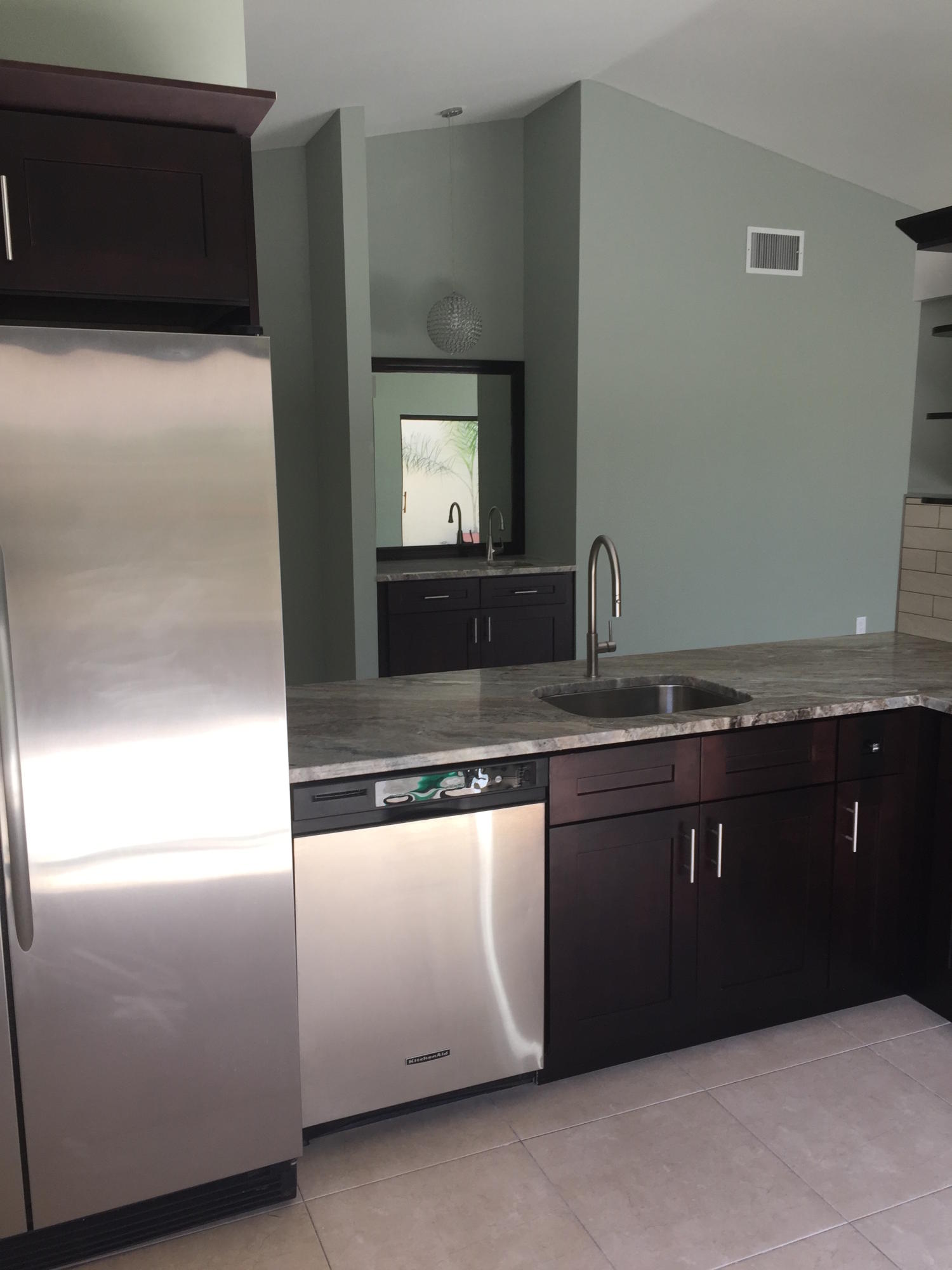 2115 Northwest 18th Street Delray Beach, FL 33445 - Photo 4 of 11 open kitchen to dining ne 18th st