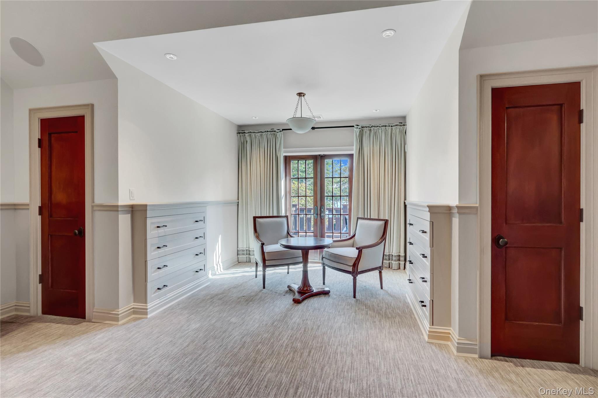 63 Dyke Road Setauket, NY 11733 - Photo 26 of 49 Sitting room with light colored carpet and baseboards