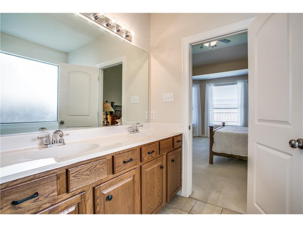 5720 Pebble Ridge Drive McKinney, TX 75070 - Photo 14 of 24 Master bath with dual sinks.
