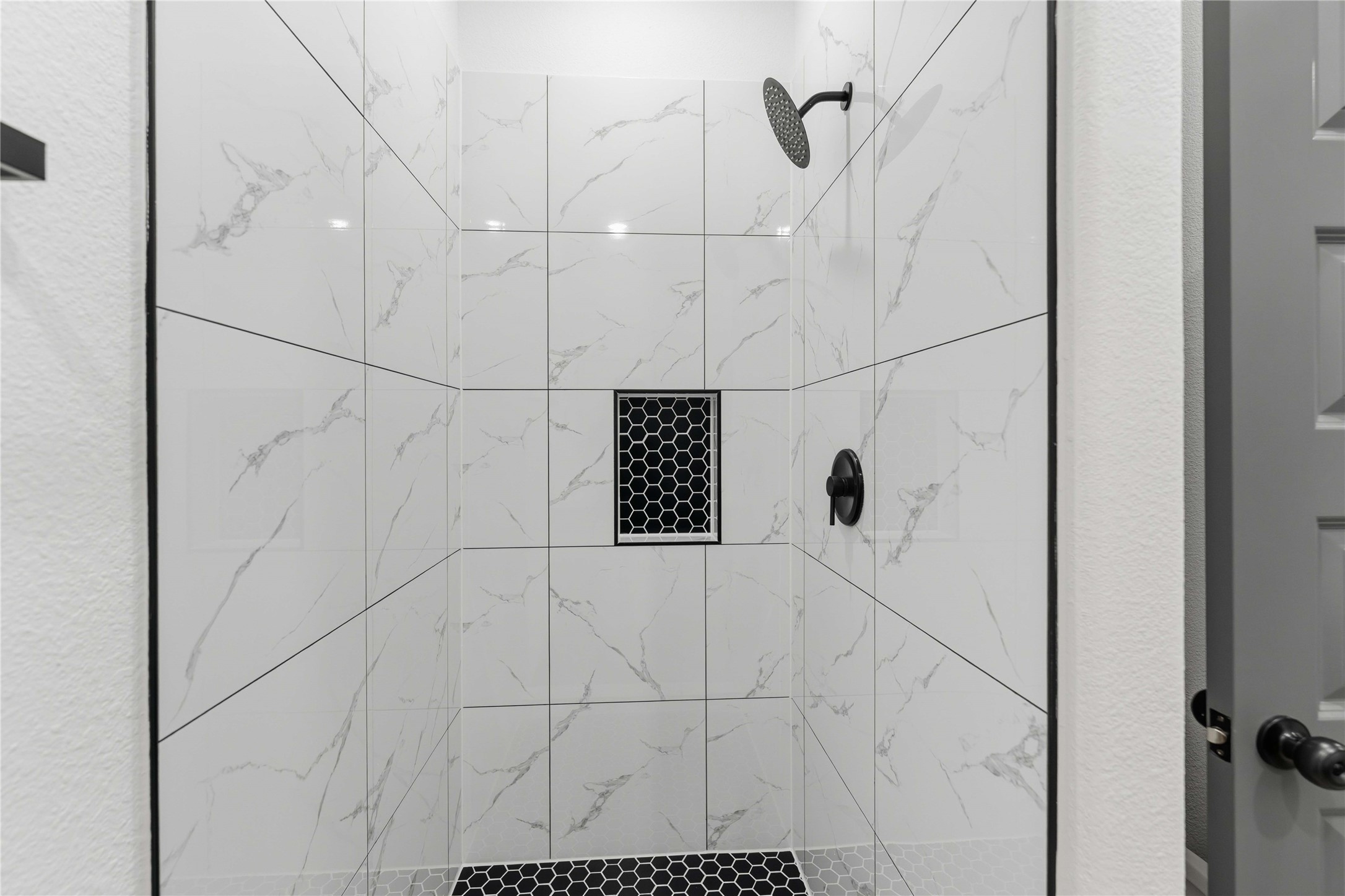 8006 Birmingham Street, Unit A/B Houston, TX 77028 - Photo 14 of 24 a bathroom with a shower