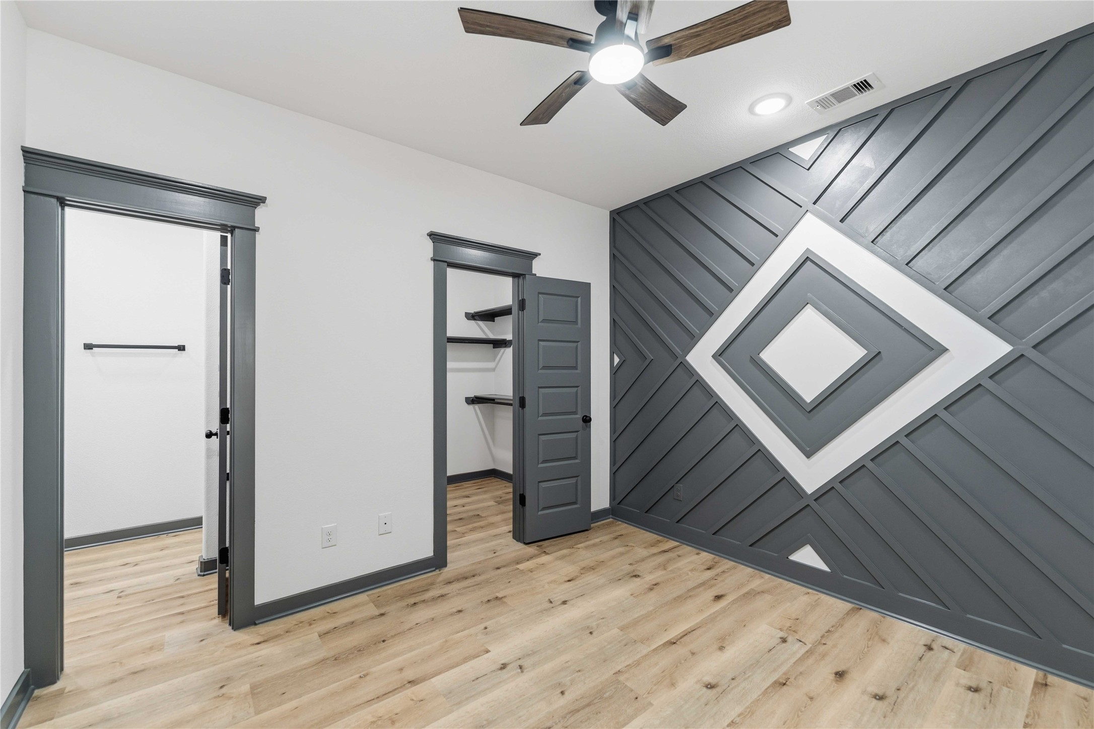 8006 Birmingham Street, Unit A/B Houston, TX 77028 - Photo 8 of 24 a view of a hallway with wooden floor and staircase