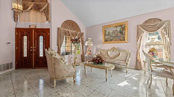 a view of a livingroom with furniture and a couch