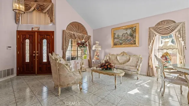 a view of a livingroom with furniture and a couch
