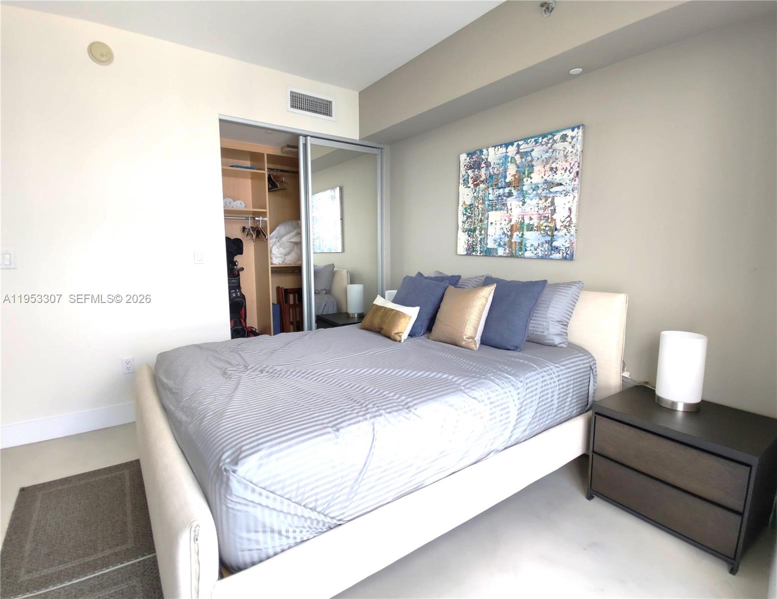 465 Brickell Avenue, Unit 4402 Miami, FL 33131 - Photo 21 of 33 a bedroom with a bed and window