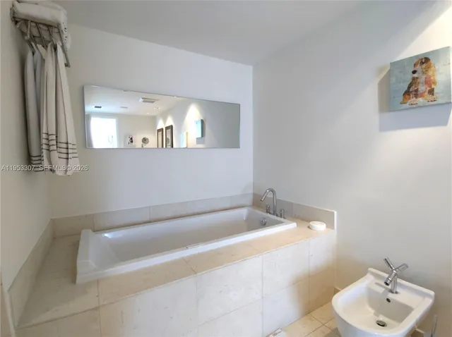 a bathroom with a bathtub