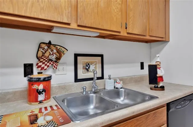 a bedroom with bed and flat screen tv