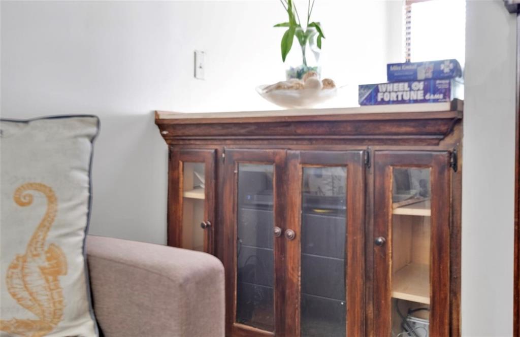 2411 Huntingdon, Unit 2411 Atlanta, GA 30350 - Photo 21 of 45 a living room with furniture and a potted plant