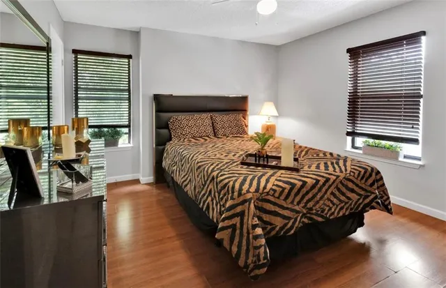 an aerial view of a house with a yard and outdoor seating