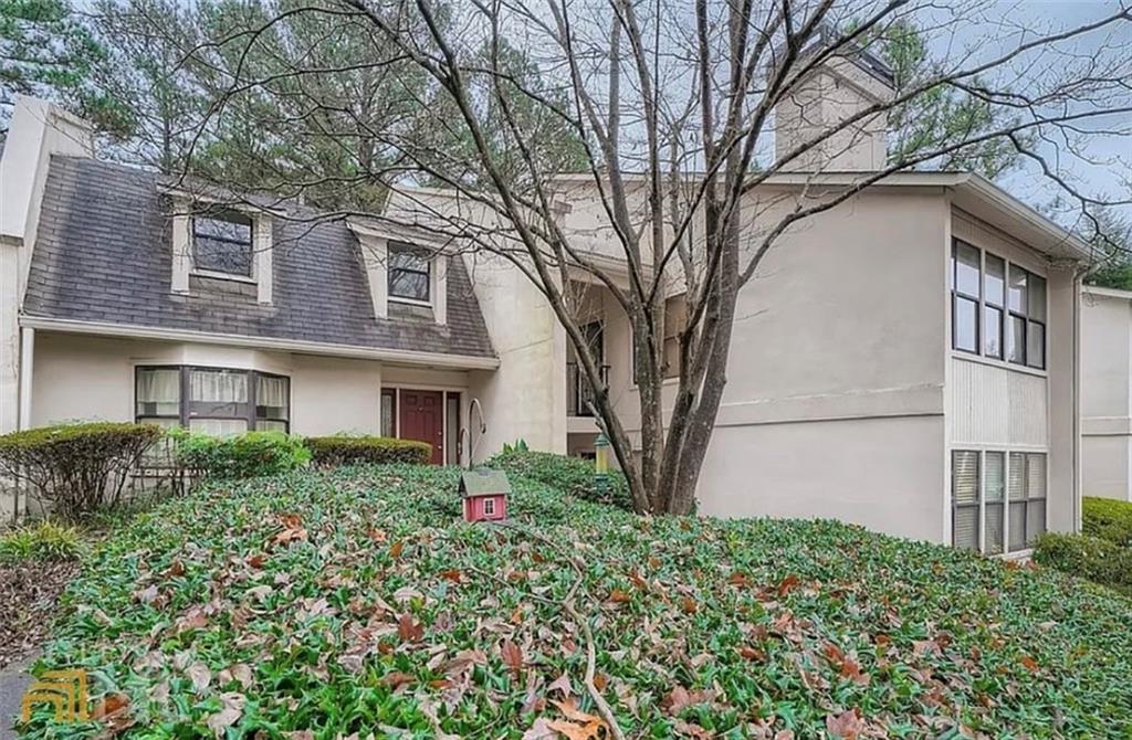 2411 Huntingdon, Unit 2411 Atlanta, GA 30350 - Photo 42 of 45 a front view of a house with garden