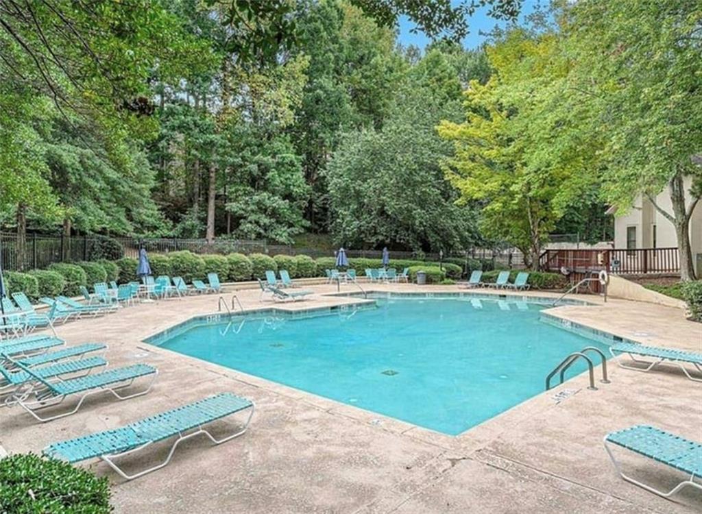 2411 Huntingdon, Unit 2411 Atlanta, GA 30350 - Photo 45 of 45 a view of a swimming pool with a patio