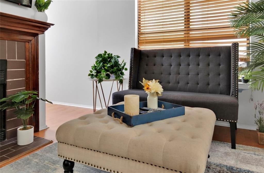 2411 Huntingdon, Unit 2411 Atlanta, GA 30350 - Photo 7 of 45 a bedroom with a bed and a potted plant