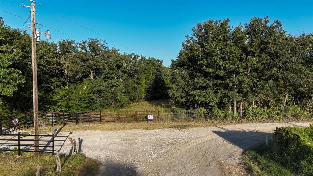 1957 Prairie Grove Road Valley View, TX 76272 - Photo 28 of 28 a view of a yard with a tree