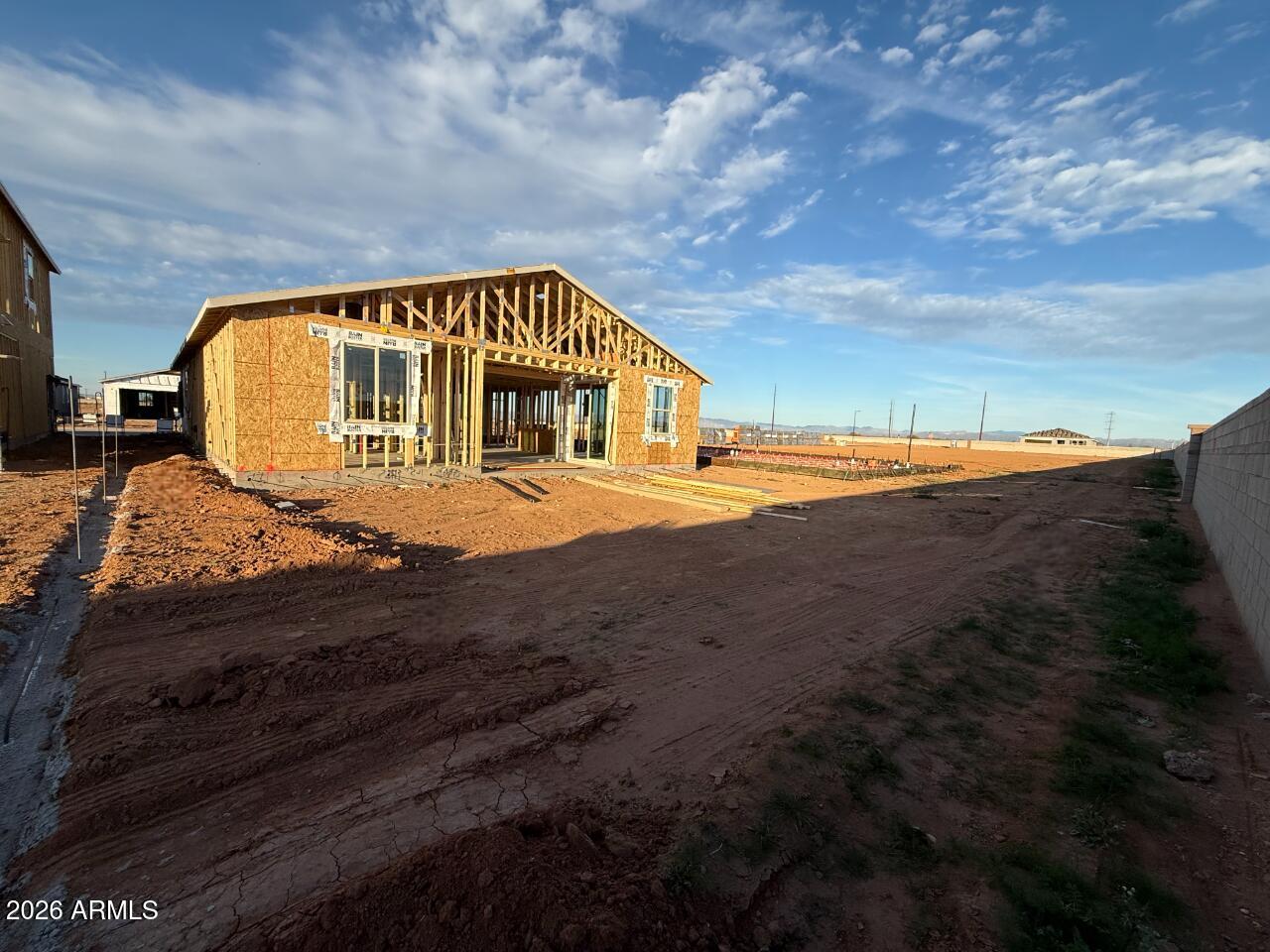 6589 East Fiddleneck Way San Tan Valley, AZ 85140 - Photo 5 of 12 a view of house with yard