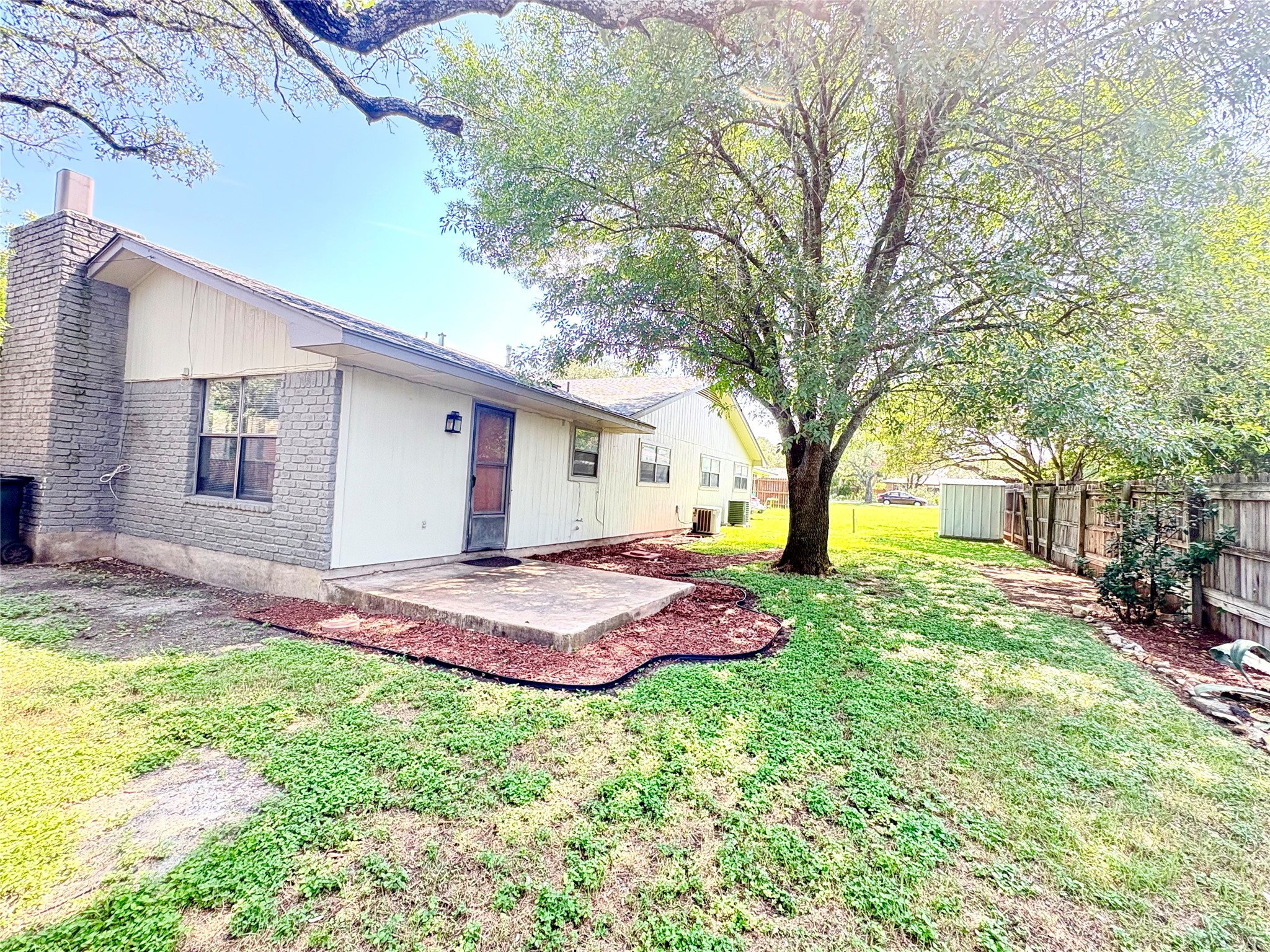 1212 Leander Road, Unit A Georgetown, TX 78628 - Photo 5 of 20 A nice backyard with a patio offers a private outdoor space for leisure.