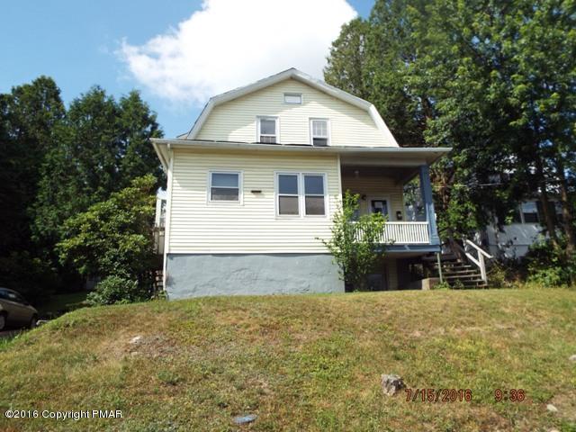 109 Perrin Avenue Shavertown, PA 18708 - Photo 1 of 13 a front view of a house with garden