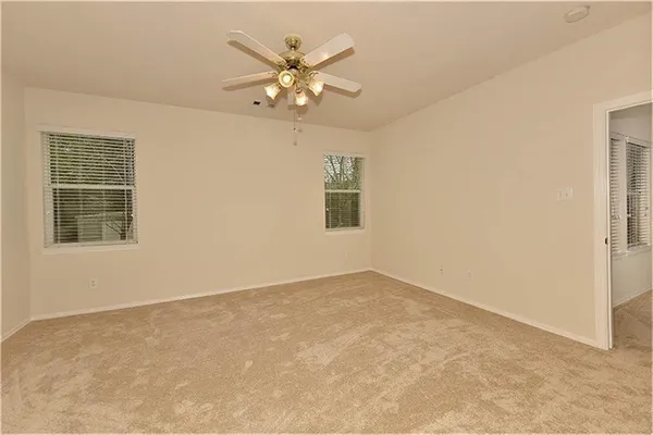 en empty room with windows
