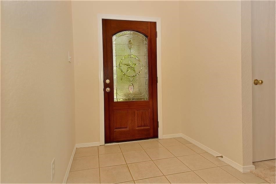263 Adobe Terrace South Conroe, TX 77316 - Photo 4 of 23 a view of an entryway door