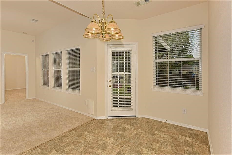 263 Adobe Terrace South Conroe, TX 77316 - Photo 8 of 23 a view of an empty room with a window