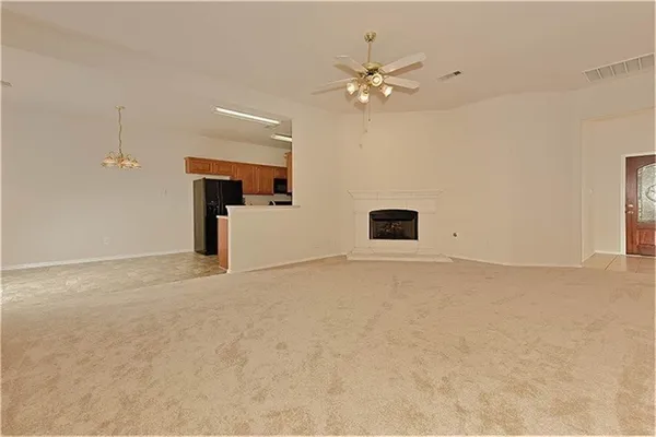 a view of a livingroom with a fireplace
