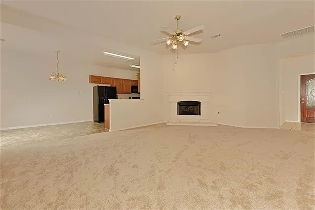 a view of a livingroom with a fireplace