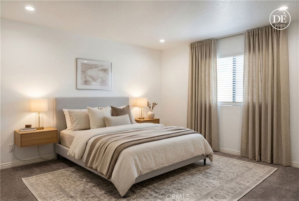 43600 Santa Rosa Circle Lancaster, CA 93535 - Photo 23 of 25 a bedroom with a bed and a painting