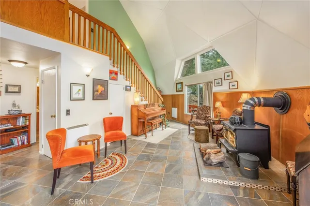 a outdoor space with lots of chairs and mirrors