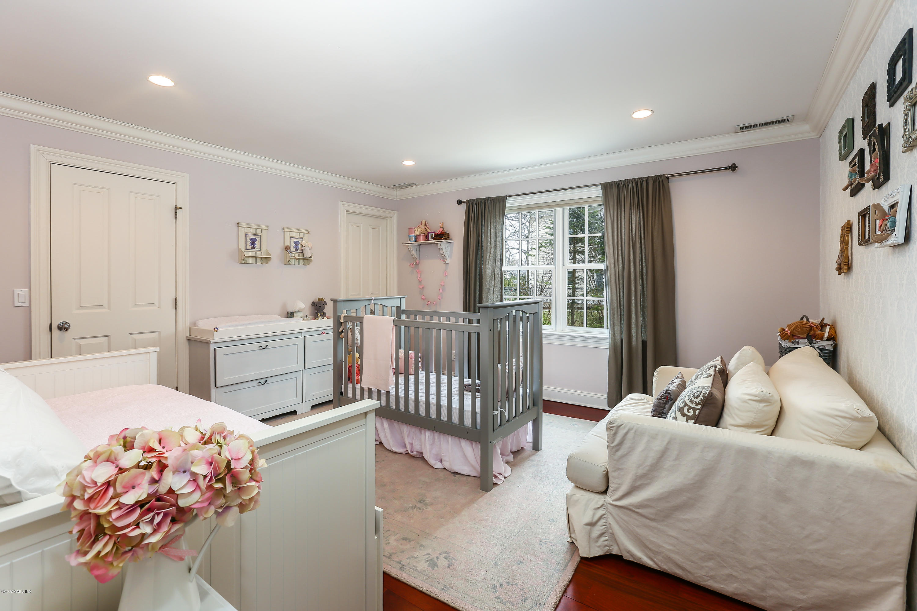 59 Riverside Lane Riverside, CT 06878 - Photo 14 of 21 a bedroom with furniture and a window