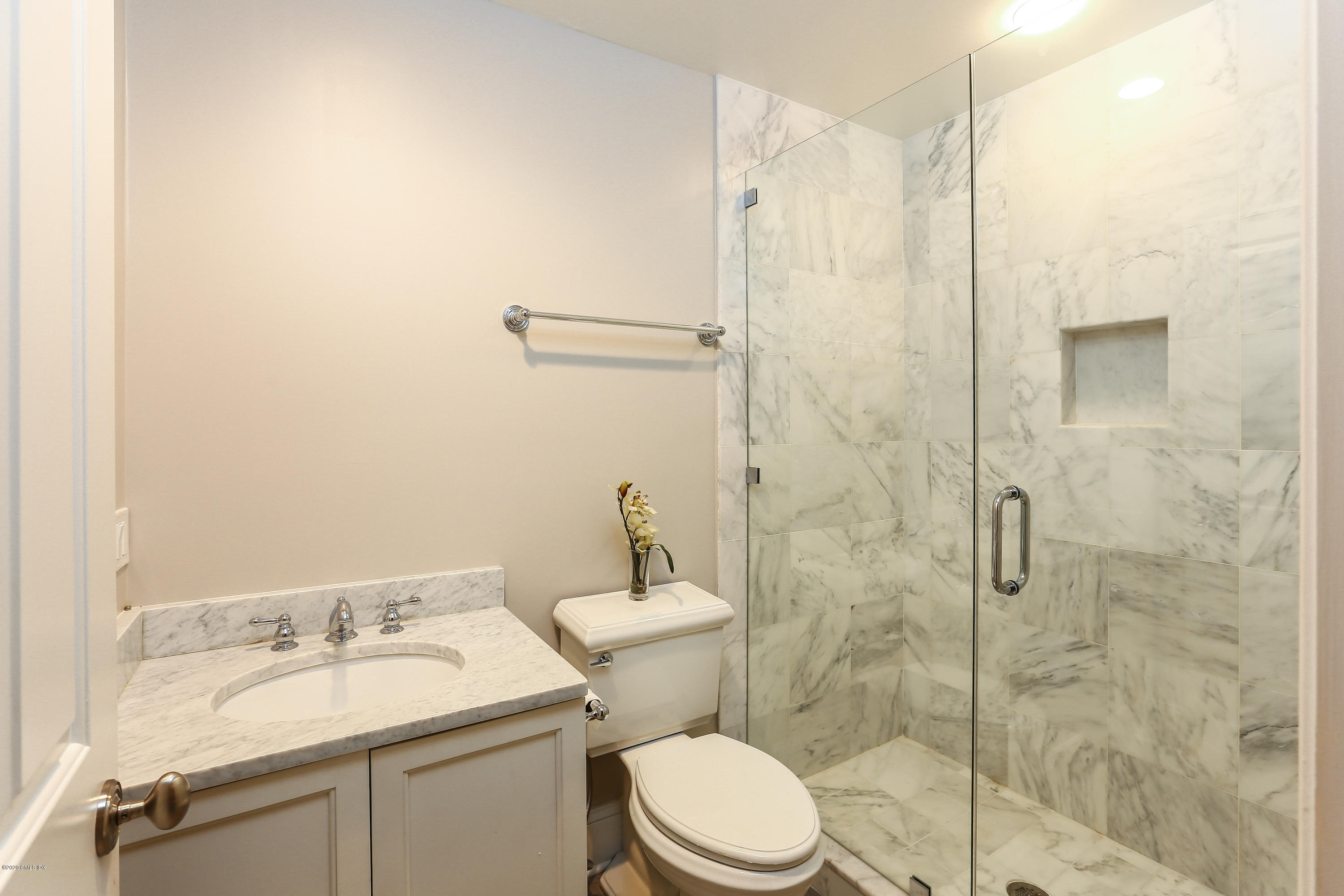 59 Riverside Lane Riverside, CT 06878 - Photo 15 of 21 a bathroom with a sink a toilet and shower
