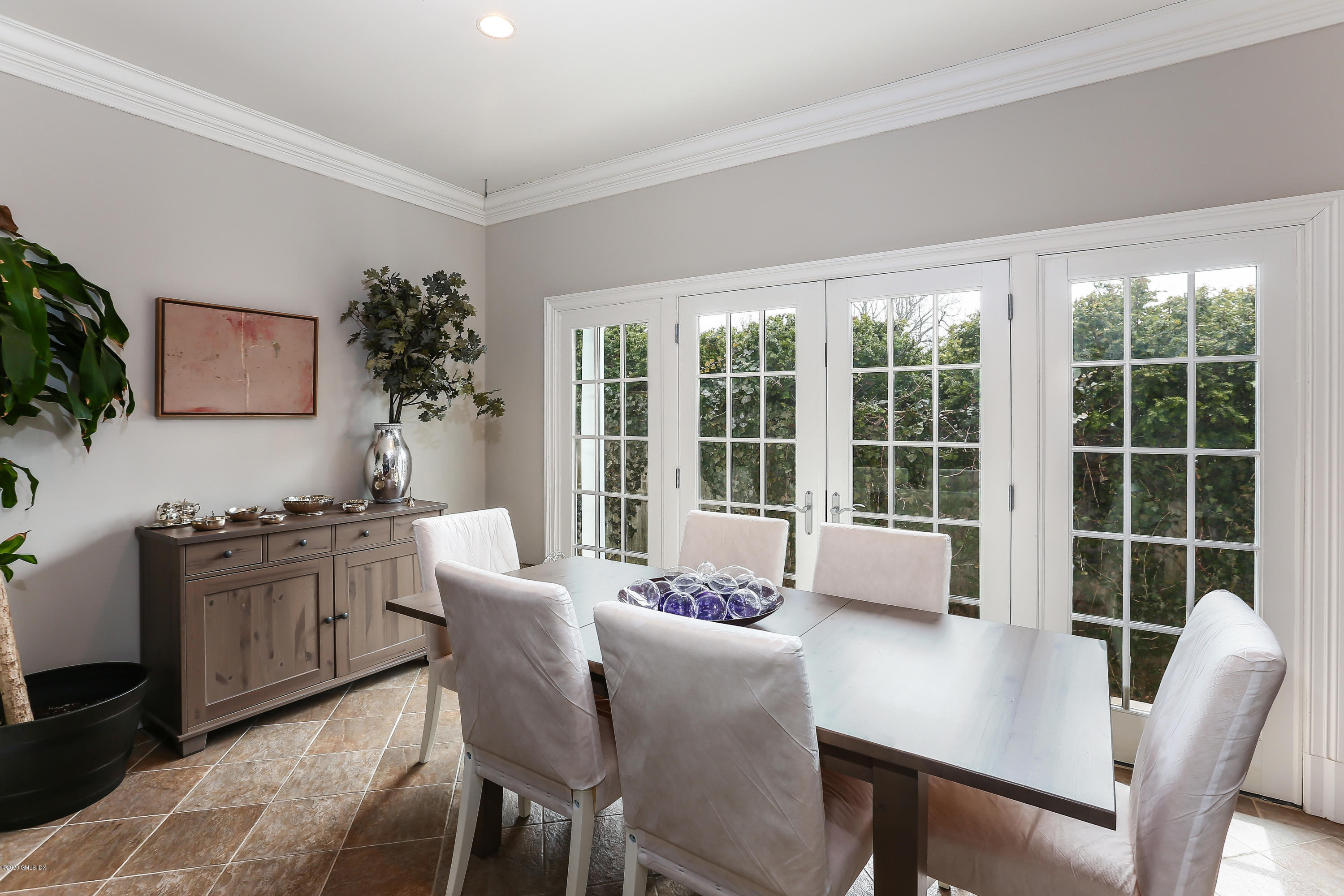 59 Riverside Lane Riverside, CT 06878 - Photo 7 of 21 a view of a dining room with furniture window and outside view