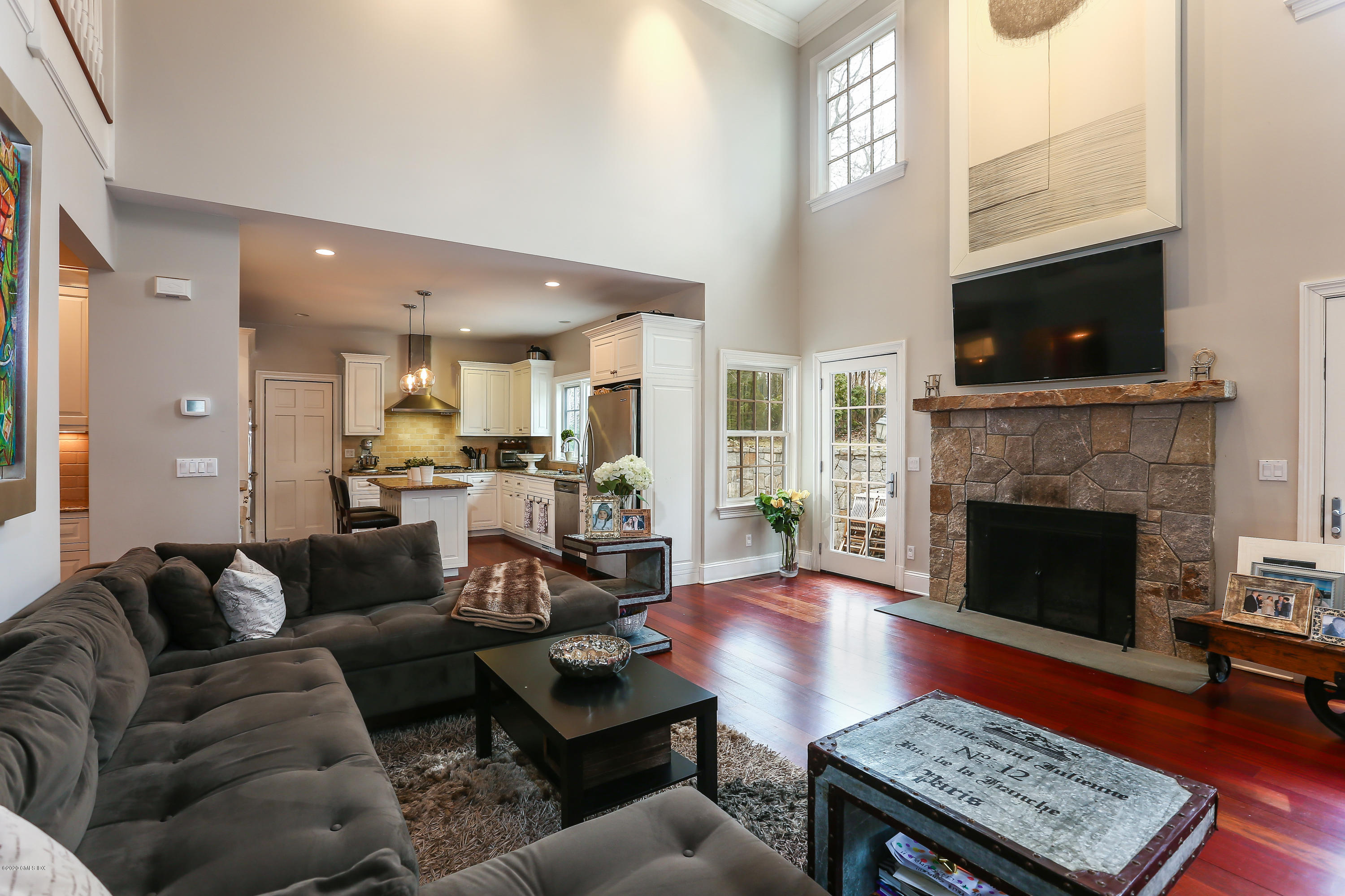59 Riverside Lane Riverside, CT 06878 - Photo 8 of 21 a living room with furniture fireplace and flat screen tv