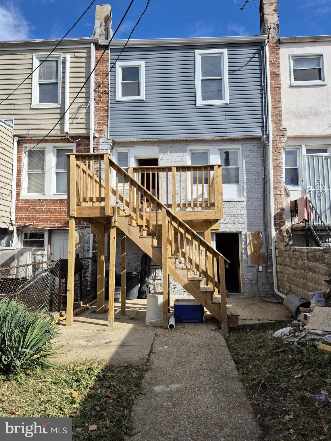 a view of a house with wooden stairs