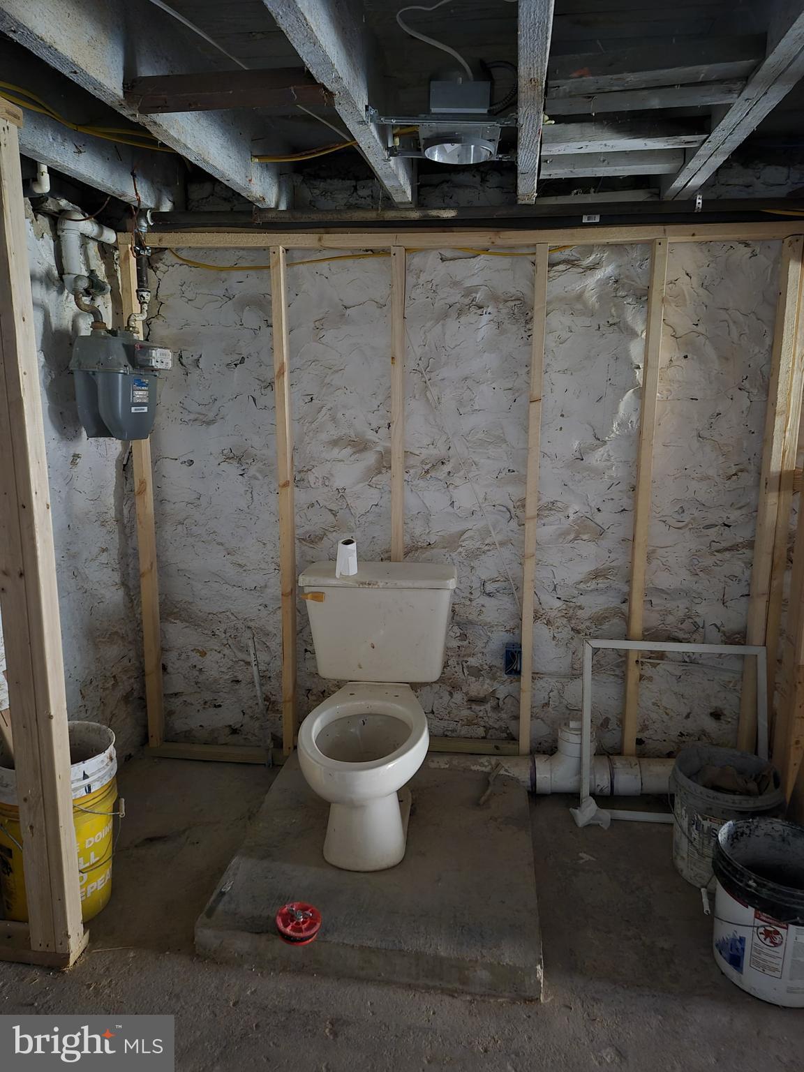 4202 Reisterstown Road Baltimore, MD 21215 - Photo 3 of 9 a bathroom with a toilet and a shower