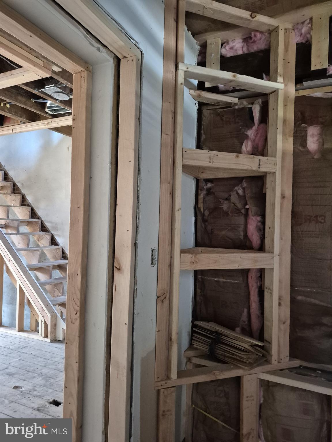 4202 Reisterstown Road Baltimore, MD 21215 - Photo 4 of 9 a kitchen with a stove and a microwave