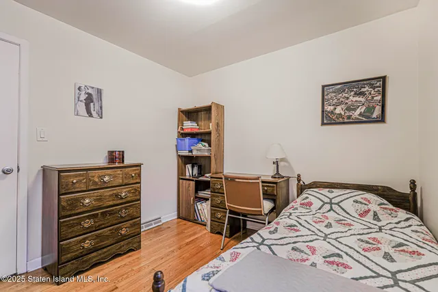 a bed room with a bed and a couch