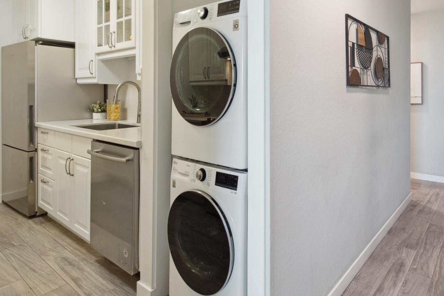 360 Vallejo Drive, Unit 98 Millbrae, CA 94030 - Photo 13 of 32 a view of a kitchen with washer and dryer