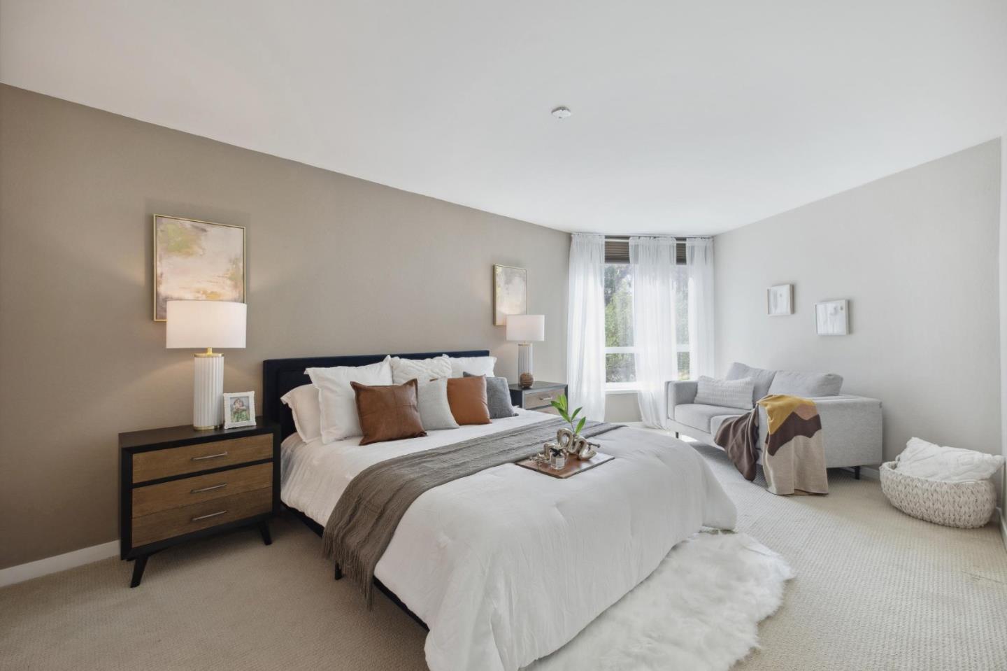 360 Vallejo Drive, Unit 98 Millbrae, CA 94030 - Photo 14 of 32 a bedroom with a bed and lamp