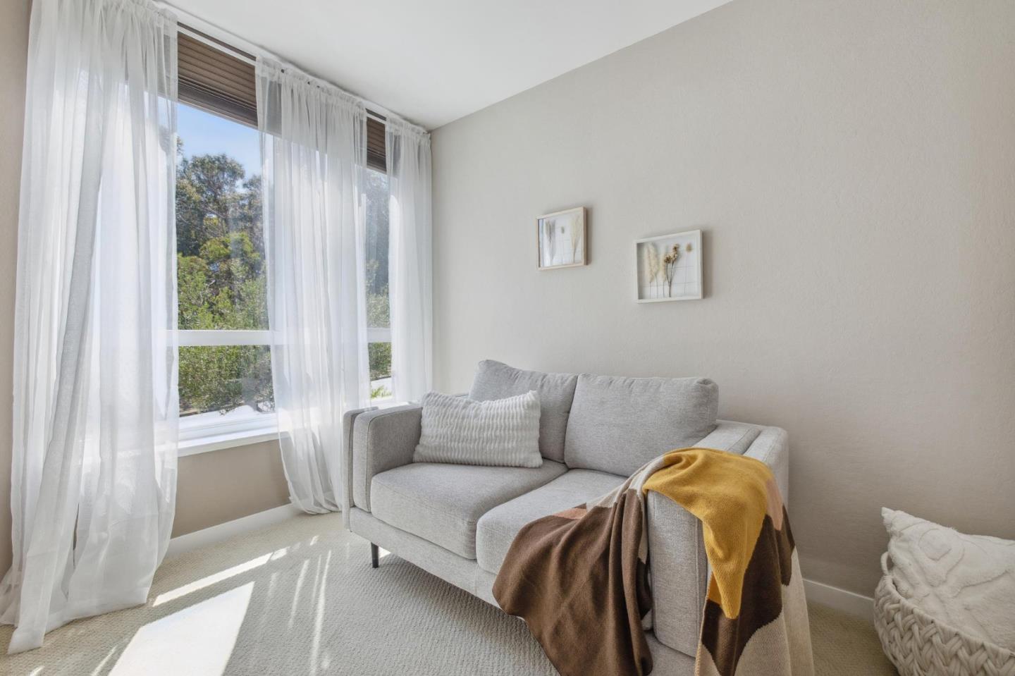 360 Vallejo Drive, Unit 98 Millbrae, CA 94030 - Photo 16 of 32 a bedroom with a bed and a window