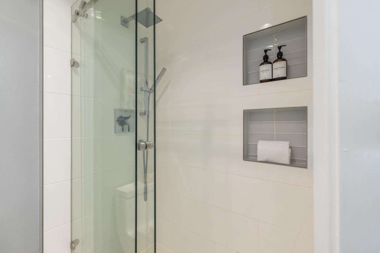 360 Vallejo Drive, Unit 98 Millbrae, CA 94030 - Photo 19 of 32 a picture of a bathroom with a shower