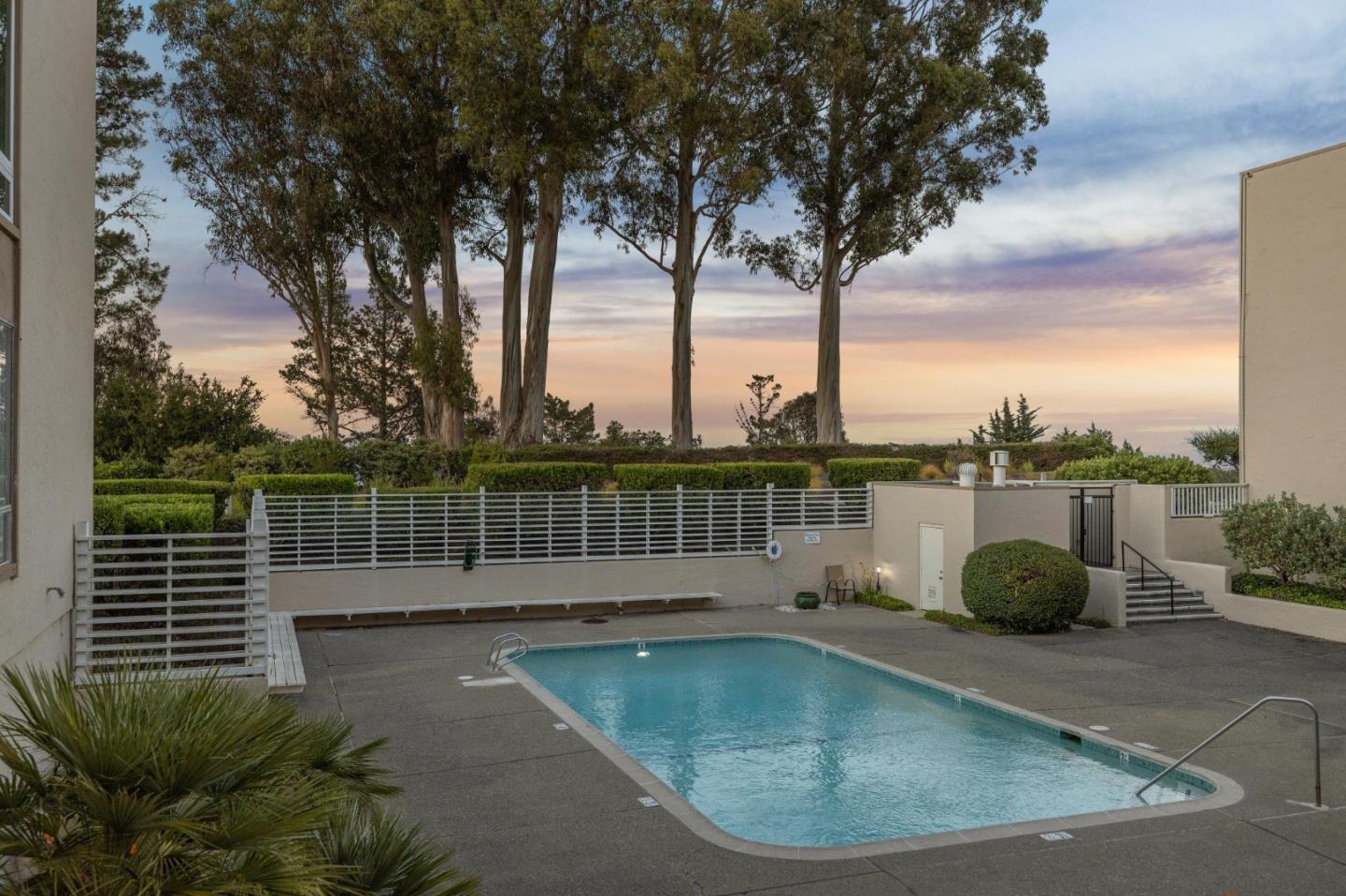 360 Vallejo Drive, Unit 98 Millbrae, CA 94030 - Photo 23 of 32 a view of a swimming pool with a sitting space