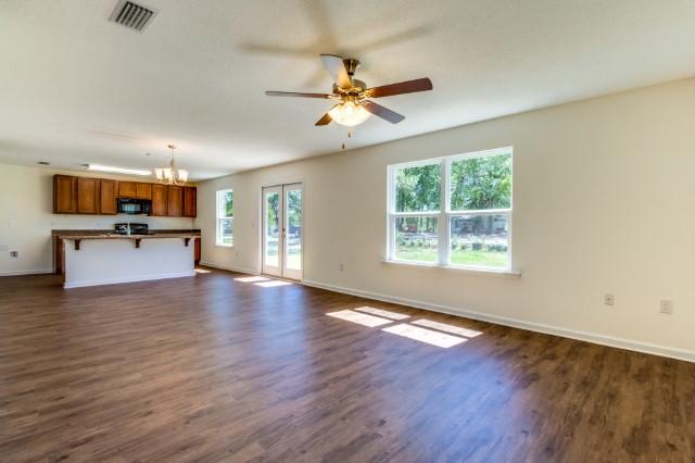 715 Widgeon Way Crestview, FL 32539 - Photo 5 of 16 Arden livingroom to kitchen