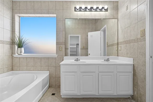 a bathroom with a sink and a bathtub