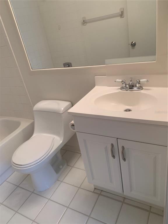 3223 South Beneva Road, Unit 103 Sarasota, FL 34232 - Photo 17 of 17 a bathroom with a sink a toilet and bathtub