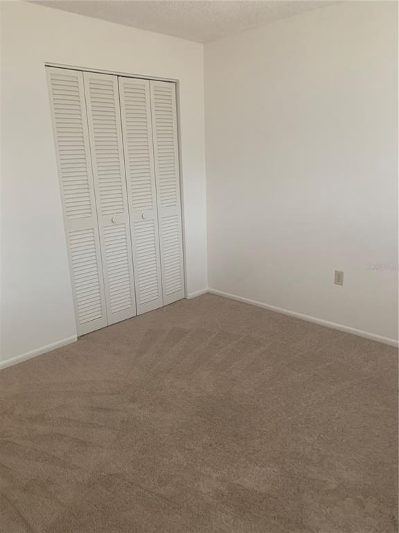 3223 South Beneva Road, Unit 103 Sarasota, FL 34232 - Photo 9 of 17 a view of an empty room