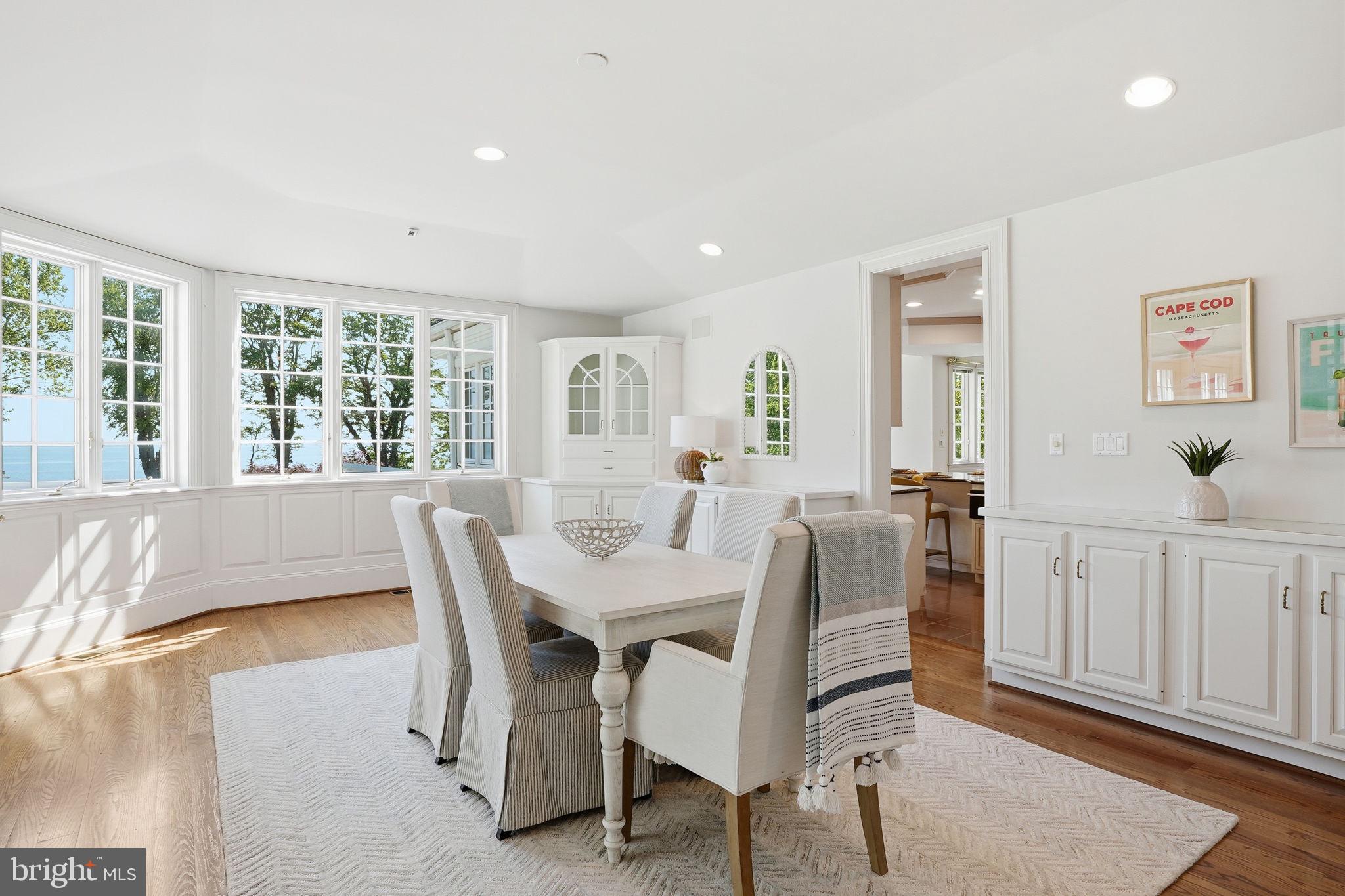 2562 Carrollton Road Annapolis, MD 21403 - Photo 13 of 54 Back inside to the dining room with a Bay backdrop
