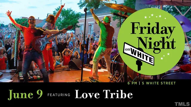 a view of a street with a tree