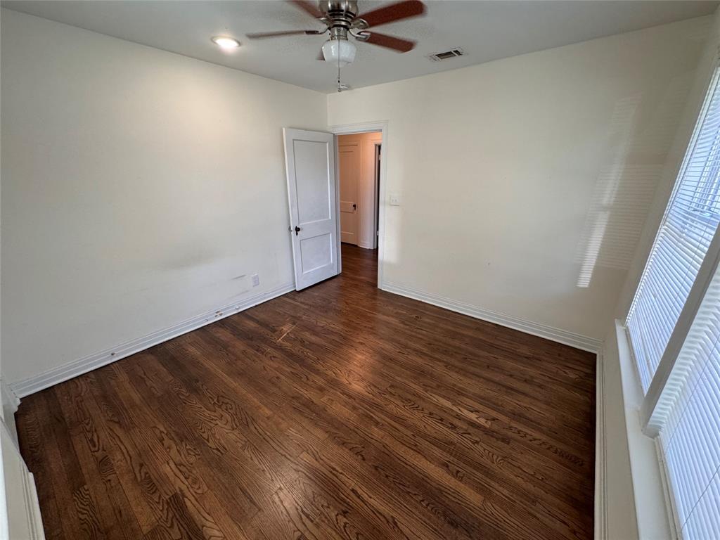 2547 Sharon Street Dallas, TX 75211 - Photo 14 of 22 a view of an empty room with a window