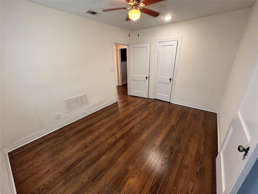 2547 Sharon Street Dallas, TX 75211 - Photo 16 of 22 wooden floor in an empty room