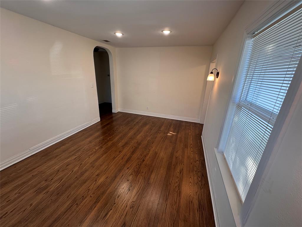 2547 Sharon Street Dallas, TX 75211 - Photo 3 of 22 a view of wooden floor in an empty room