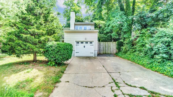 a view of a back yard of the house