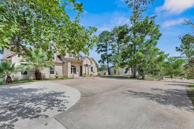 front view of a house with a trees
